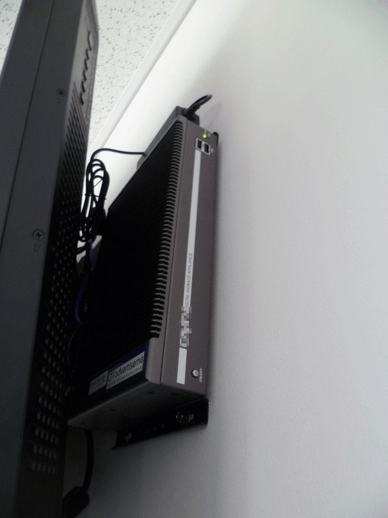 digital signage player behind screen 3.JPG